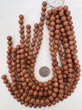 goldstone, 10mm round, 15" strand, sold per strand
