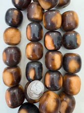 dark chocolate brown peach , faux bone, vintage look resin, 30x27mm barrel, 15" strand,  SOLD PER STRAND