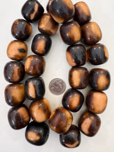 dark chocolate brown peach , faux bone, vintage look resin, 30x27mm barrel, 15" strand,  SOLD PER STRAND