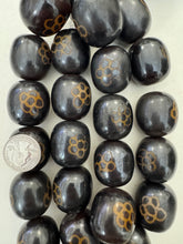 dark brown golden flower motif, faux bone, vintage look resin, 32x30mm barrel, 15" strand,    SOLD PER STRAND