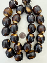 dark chocolate brown off white, faux bone, vintage look resin, 32x29mm barrel, 15" strand,  SOLD PER STRAND