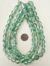 clear sea foam green metallic silver inside lined, vintage stock glass, 16x13mm barrel, 15" strand, sold per strand