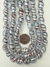 clear brown spiral metallic silver inside lined, vintage stock glass, 15x12mm barrel, 15" strand, sold per strand