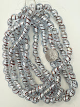 clear brown spiral metallic silver inside lined, vintage stock glass, 15x12mm barrel, 15" strand, sold per strand