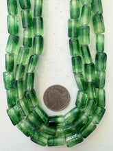 light and dark pale green two tone, vintage stock glass, 12x8mm pear, 15" strand, sold per strand