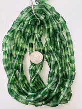 light and dark pale green two tone, vintage stock glass, 12x8mm pear, 15" strand, sold per strand