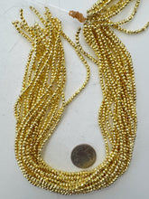gold plated glass, 3x2.5mm faceted rondelle, 15" strand, sold per strand