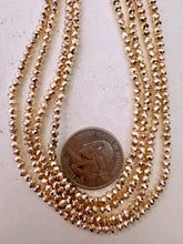 rose gold plated glass, 3x2.5mm faceted rondelle, 15" strand, sold per strand