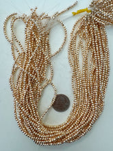 rose gold plated glass, 3x2.5mm faceted rondelle, 15" strand, sold per strand