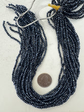 metallic dark gray gunmetal blue plated glass, 3x2.5mm faceted rondelle, 14" strand, sold per strand