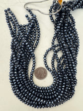 metallic dark gray gunmetal blue plated glass, 6x4.5mm faceted rondelle, 15" strand, sold per strand
