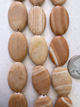 peach jasper, 29x19x7mm oval, 15" strand,  SOLD PER STRAND
