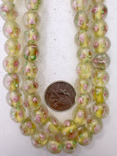 pink rose motif pale yellow inside lined, dull finish, vintage stock glass, 13mm round, 13" strand, sold per strand