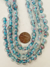 pink rose motif ice blue inside lined, dull finish, vintage stock glass, 10mm round, 12" strand, sold per strand
