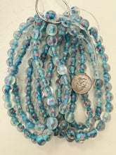 pink rose motif ice blue inside lined, dull finish, vintage stock glass, 10mm round, 12" strand, sold per strand