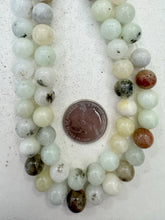 inclusions quartz, 10mm round, 15" strand,   SOLD PER STRAND