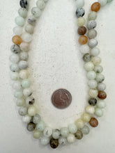 inclusions quartz, 10mm round, 15" strand,   SOLD PER STRAND