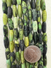 chinese chrysocolla, may have an occasional broken bead,  17x7mm 3 sided tube, 15" strand,  SOLD PER STRAND