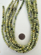 yellow turquoise, 6mm round, 15" strand,  SOLD PER STRAND