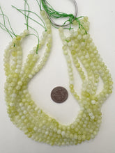 color enhanced quartz: pale lime green, 6mm round, 15" strand, sold per strand
