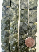 bc nephrite jade, surface wear, 31x21x6mm wavy rectangle, 15" strand,   SOLD PER STRAND