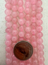 color enhanced rose quartz, 8mm round, 15" strand,   SOLD PER STRAND