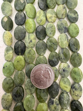 BC nephrite jade, dull finish, 16x12x6mm faceted oval, 15" strand,   SOLD PER STRAND