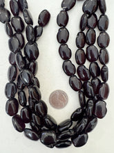 color enhanced quartz: very dark red, 21x16x7mm oval nugget, 15" strand,   SOLD PER STRAND