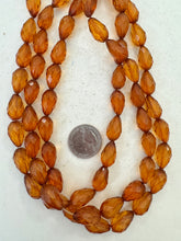 dark amber orange, vintage stock resin, 17x10mm faceted pear teardrop, 15" strand,  SOLD PER STRAND