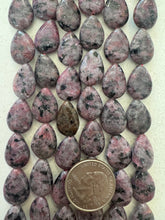 color enhanced black labradorite: pale ruby pink, semi dull finish, 17x13x6mm teardrop, 15" strand,   SOLD PER STRAND