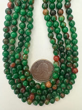 orange red green enhanced quartz, 6mm faceted round, 15" strand, sold per strand