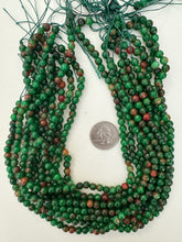 orange red green enhanced quartz, 6mm faceted round, 15" strand, sold per strand