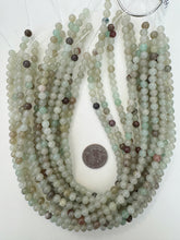 color enhanced quartz: dark pale mint green brown, 6mm round, 15" strand, sold per strand