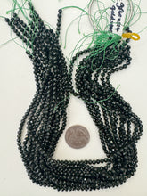 green goldstone (glass), 4mm faceted round, 15" strand, sold per strand