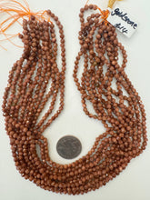 goldstone (glass), 4mm faceted round, 15" strand, sold per strand
