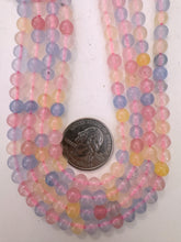 color enhanced quartz: pastel pink blue yellow, 6mm round, 15" strand, sold per strand