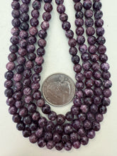 color enhanced serpentine: royal red purple, 6mm faceted round, 15" strand, sold per strand