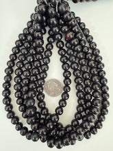 black, single color, vintage look resin, 11x10mm rondelle, 15" strand, sold per strand