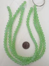 color enhanced quartz: bright pale green, 8mm round, 15" strand, sold per strand
