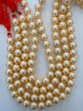 light pale orange peach, vintage stock coated shell pearls, 14mm round, 16" strand, SOLD PER STRAND