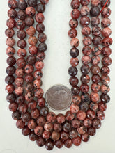 color enhanced serpentine: dark pale red orange, 8mm faceted round, 15" strand, sold per strand