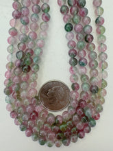 color enhanced quartz: pink purple dark green, 6mm round, 15" strand, sold per strand