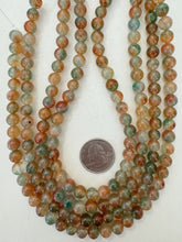 color enhanced quartz: orange green, 8mm round, 15" strand, sold per strand