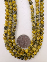 color enhanced serpentine: yellow, 6mm faceted round, 15" strand, sold per strand