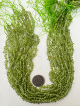 peridot, 4mm mixed size chip nuggets, 15" strand, sold per strand