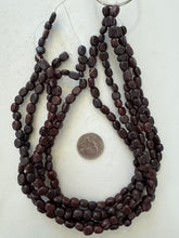 color enhanced serpentine: dark red brown, 6-9mm nugget, 15" strand, sold per strand