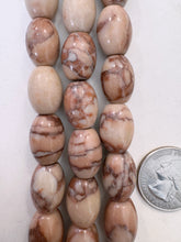 dark peach jasper, 16x12mm barrel, 15" strand,   SOLD PER STRAND