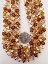 brown golden mix, white ab coated, glass, 7mm fancy cut faceted corder cut cube, 13" strand, sold per strand