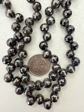 dark brown gunmetal coated, glass, 9mm fancy cut faceted side drilled round, 32" strand, sold per strand