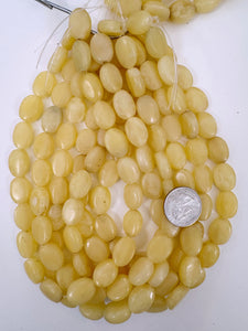 pearly pale yellow, vintage look resin, 17x13x6mm oval, 15" strand, sold per strand